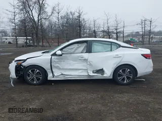 2022 Nissan Sentra SV z VIN 3N1AB8CV3NY307506, wystawiony jako IAAI lot #41830376 z przebiegiem 6 899 mil mil oraz . Historia ofert i sprzedaży dostępna na DreamBid. Obrazek 14.
