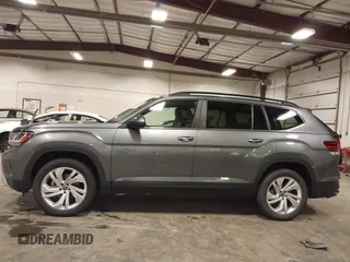 2021 Volkswagen Atlas SE z VIN 1V2KR2CA5MC606590, wystawiony jako IAAI lot #42383813 z przebiegiem 45 087 mil mil oraz . Historia ofert i sprzedaży dostępna na DreamBid. Obrazek 14.