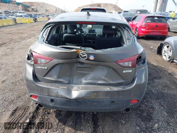 2014 Mazda 3 i Grand Touring with VIN JM1BM1M75E1207754, listed as a IAAI auction lot 41698583 with 128,887 mi miles and . Bid and sale history available at DreamBid. Image 6.