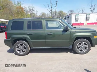 2008 Jeep Patriot Sport with VIN 1J8FF28W98D785130, listed as a IAAI auction lot 42069574 with 180,092 mi miles. Bid and sale history available at carsss.com. Image 13.