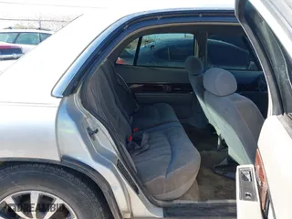 1999 Buick LeSabre Custom with VIN 1G4HP52KXXH500765, listed as a IAAI auction lot 42048182 with 276,575 mi miles. Bid and sale history available at carsss.com. Image 8.
