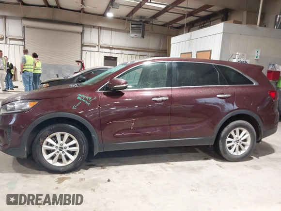 2019 Kia Sorento L with VIN 5XYPG4A34KG548624, listed as a IAAI auction lot 42020831 with 124,226 mi miles. Bid and sale history available at carsss.com. Image 14.