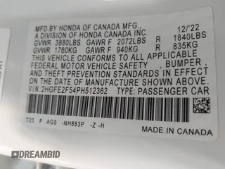 2023 Honda Civic Sport with VIN 2HGFE2F54PH512362, listed as a IAAI auction lot 41401479 with 12,672 mi miles and . Bid and sale history available at DreamBid. Image 9.