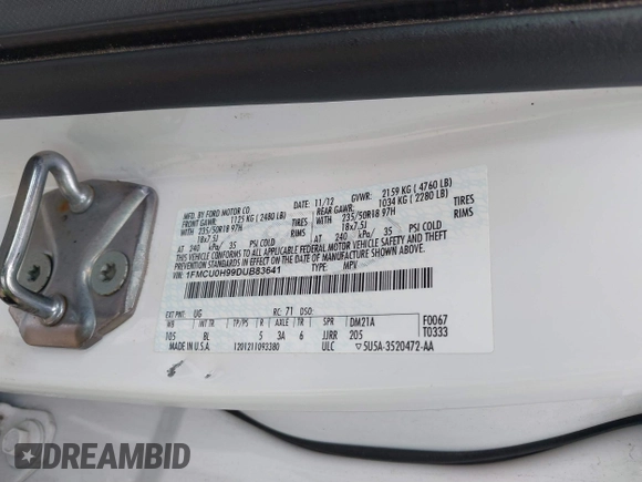 2013 Ford Escape SEL with VIN 1FMCU0H99DUB83641, listed as a IAAI auction lot 41578882 with 124,872 mi miles. Bid and sale history available at carsss.com. Image 9.