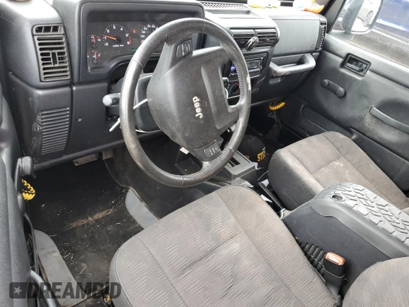 2005 Jeep Wrangler Unlimited with VIN 1J4FA44S75P358246, listed as a Copart auction lot 60958695 with 150,003 mi miles and Salvage title. Bid and sale history available at DreamBid. Image 8.
