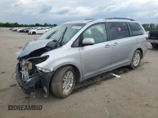 2015 Toyota Sienna XLE with VIN 5TDYK3DC1FS541180, listed as a Copart auction lot 59078585 with 94,014 mi miles and Salvage title. Bid and sale history available at DreamBid. Image 1.