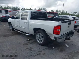 2012 Chevrolet Silverado 1500 LT with VIN 3GCPCSE03CG222445, listed as a IAAI auction lot 41217503 with 229,097 mi miles. Bid and sale history available at carsss.com. Image 3.