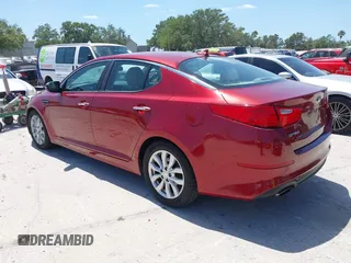 2014 Kia Optima LX with VIN 5XXGM4A75EG329546, listed as a IAAI auction lot 42159226 with 200,963 mi miles. Bid and sale history available at carsss.com. Image 3.