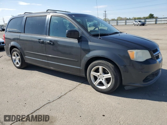 2012 Dodge Grand Caravan SXT with VIN 2C4RDGCG8CR204035, listed as a Copart auction lot 54743005 with 187,533 mi miles and Clean Title. Bid and sale history available at DreamBid. Image 4.