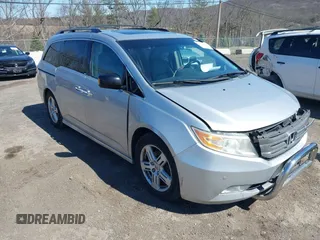 2012 Honda Odyssey Touring with VIN 5FNRL5H93CB042392, listed as a IAAI auction lot 41859533 with 169,141 mi miles. Bid and sale history available at carsss.com. Image 1.