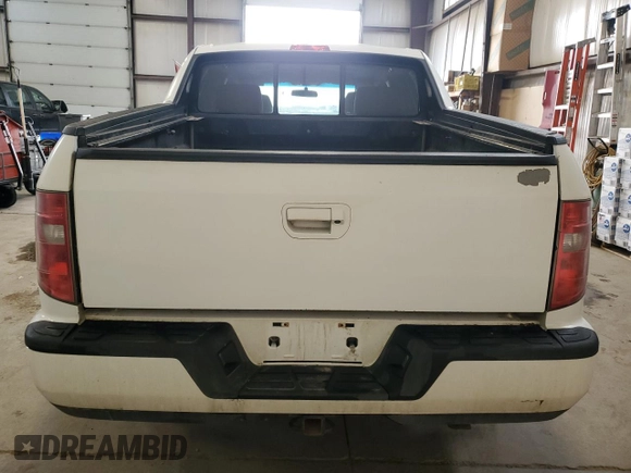 2012 Honda Ridgeline RTL with VIN 5FPYK1F59CB501178, listed as a Copart auction lot 60634535 with 165,766 mi miles and Salvage title. Bid and sale history available at DreamBid. Image 6.
