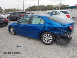 2020 Toyota Camry LE with VIN 4T1L11AK5LU310671, listed as a IAAI auction lot 41732306 with 61,379 mi miles and . Bid and sale history available at carsss.com. Image 15.