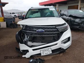 2022 Ford Explorer XLT z VIN 1FMSK7DH0NGB25926, wystawiony jako IAAI lot #42181595 z przebiegiem 15 063 mil mil oraz . Historia ofert i sprzedaży dostępna na DreamBid. Obrazek 12.