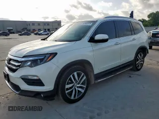 2018 Honda Pilot Touring с VIN 5FNYF6H94JB070417, выставлен на аукционе Copart как лот 62082875 с пробегом 93 444 миль миль и Списание • Salvage title. История ставок и продаж доступна на DreamBid. Изображение 1.