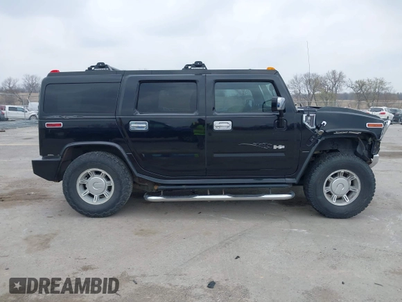 2005 Hummer H2 SUV z VIN 5GRGN23UX5H106375, wystawiony jako IAAI lot #41997745 z przebiegiem 152 827 mil mil oraz . Historia ofert i sprzedaży dostępna na DreamBid. Obrazek 13.
