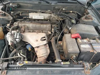 1996 Toyota Camry DX z VIN JT2BG12K0T0417267, wystawiony jako IAAI lot #42386332 z przebiegiem 222 688 mil mil oraz . Historia ofert i sprzedaży dostępna na DreamBid. Obrazek 10.