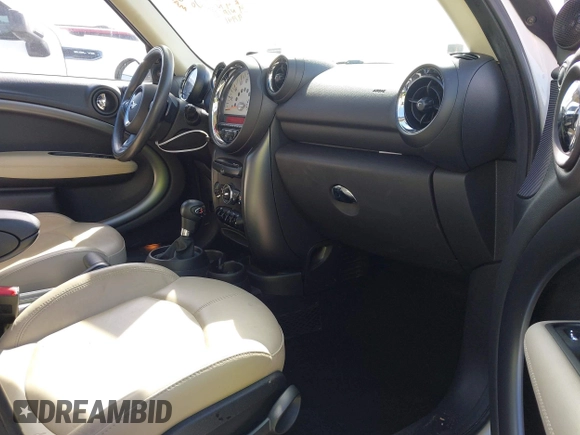 2014 MINI Countryman S with VIN WMWZC3C52EWP26869, listed as a IAAI auction lot 41756310 with 91,941 mi miles and . Bid and sale history available at DreamBid. Image 5.
