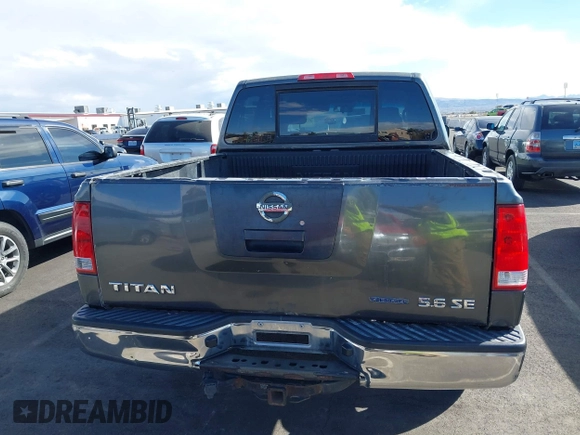 2010 Nissan Titan XE with VIN 1N6BA0EJ5AN304045, listed as a IAAI auction lot 41794718 with 297,551 mi miles. Bid and sale history available at carsss.com. Image 16.