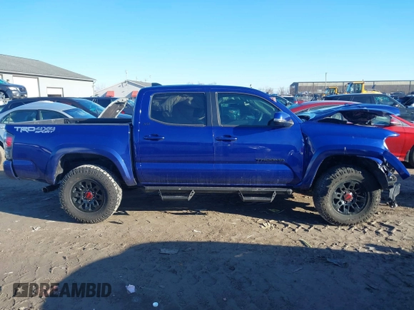 2023 Toyota Tacoma 4WD SR with VIN 3TMCZ5AN9PM559919, listed as a IAAI auction lot 41855044 with 46,153 mi miles. Bid and sale history available at carsss.com. Image 14.