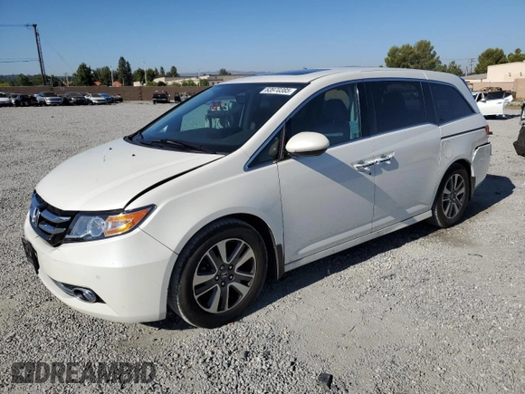 2016 Honda Odyssey Touring Elite with VIN 5FNRL5H9XGB006981, listed as a Copart auction lot 63970385 with 165,164 mi miles and Salvage title. Bid and sale history available at DreamBid. Image 1.