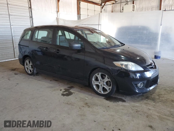 2010 Mazda 5 Sport with VIN JM1CR2W33A0366990, listed as a Copart auction lot 49799535 with 256,933 mi miles and Salvage Title. Bid and sale history available at DreamBid. Image 4.
