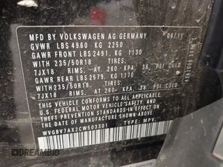 2012 Volkswagen Tiguan SE with VIN WVGBV7AX2CW503301, listed as a IAAI auction lot 42679407 with 90,603 mi miles and . Bid and sale history available at DreamBid. Image 9.