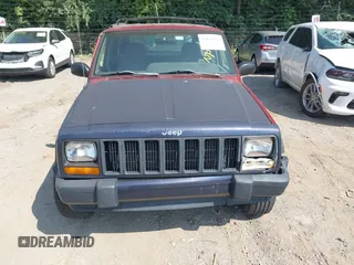 1998 Jeep Cherokee Sport with VIN 1J4FJ68SXWL164891, listed as a IAAI auction lot 42814173 with 162,986 mi miles and . Bid and sale history available at DreamBid. Image 6.