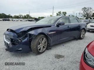 2016 Jaguar XJ Portfolio z VIN SAJWJ2GDXG8W00632, wystawiony jako Copart lot #65025695 z przebiegiem 31 469 mil mil oraz Szkoda całkowita • Salvage title. Historia ofert i sprzedaży dostępna na DreamBid. Obrazek 1.