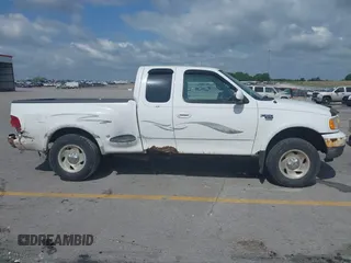 2000 Ford F-150 z VIN 2FTRX08W3YCA83858, wystawiony jako IAAI lot #42569957 z przebiegiem Nie podano mil oraz . Historia ofert i sprzedaży dostępna na DreamBid. Obrazek 13.