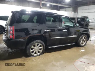 2009 GMC Yukon Denali z VIN 1GKFK03279R282409, wystawiony jako Copart lot #51534755 z przebiegiem 197 150 mil mil oraz Tytuł czysty. Historia ofert i sprzedaży dostępna na DreamBid. Obrazek 3.