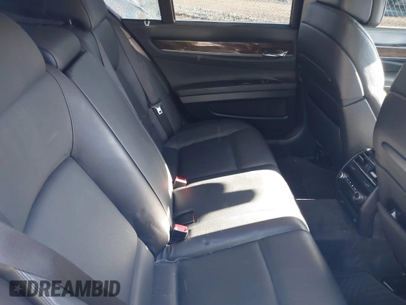 2011 BMW 7 Series 740i with VIN WBAKA4C58BC392020, listed as a IAAI auction lot 41314751 with 116,553 mi miles. Bid and sale history available at carsss.com. Image 8.