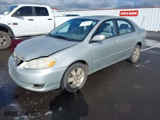 2004 Toyota Corolla CE with VIN 1NXBR38E34Z277929, listed as a IAAI auction lot 41807213 with 197,757 mi miles. Bid and sale history available at carsss.com. Image 2.