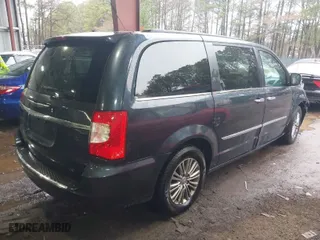 2014 Chrysler Town & Country Touring-L 30th Anniversary with VIN 2C4RC1CG1ER249935, listed as a IAAI auction lot 41553454 with 157,184 mi miles. Bid and sale history available at carsss.com. Image 4.