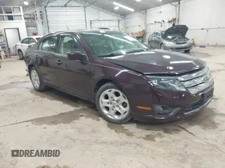 2011 Ford Fusion SE with VIN 3FAHP0HAXBR308930, listed as a IAAI auction lot 42028352 with 116,116 mi miles. Bid and sale history available at carsss.com. Image 1.