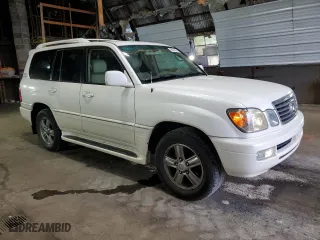 2006 Lexus LX 470 with VIN JTJHT00W464015842, listed as a Copart auction lot 66004384 with 104,402 mi miles and Salvage Title. Bid and sale history available at carsss.com. Image 4.