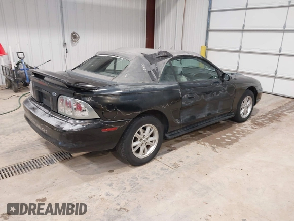 1998 Ford Mustang GT with VIN 1FAFP45X5WF249652, listed as a IAAI auction lot 41830267 with 210,192 mi miles. Bid and sale history available at carsss.com. Image 4.