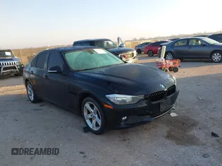 2015 BMW 3 Series 320i with VIN WBA3B1C53FP831476, listed as a IAAI auction lot 41219821 with 108,852 mi miles. Bid and sale history available at carsss.com. Image 1.