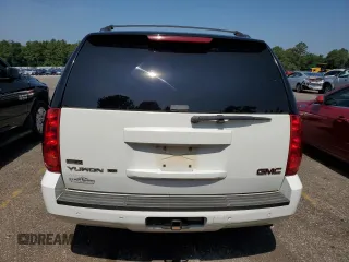 2009 GMC Yukon SLT w/4SA with VIN 1GKEC33309R214195, listed as a Copart auction lot 61430404 with 174,776 mi miles and Salvage Title. Bid and sale history available at carsss.com. Image 6.