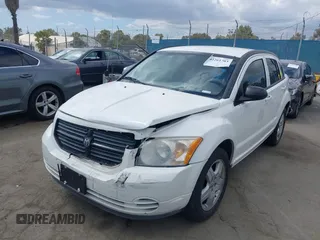 2009 Dodge Caliber SXT z VIN 1B3HB48A79D241014, wystawiony jako IAAI lot #42261703 z przebiegiem 250 197 mil mil oraz . Historia ofert i sprzedaży dostępna na DreamBid. Obrazek 2.