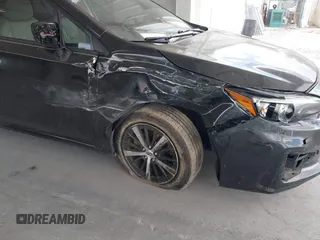 2019 Subaru Impreza Premium z VIN 4S3GTAD66K3730877, wystawiony jako IAAI lot #42144832 z przebiegiem 51 468 mil mil oraz . Historia ofert i sprzedaży dostępna na DreamBid. Obrazek 6.