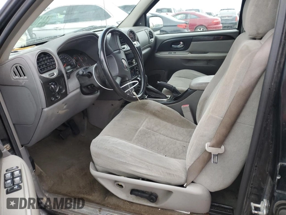 2005 GMC Envoy SLT with VIN 1GKDT13S952165475, listed as a Copart auction lot 44102465 with 0 mi miles and Salvage Title. Bid and sale history available at carsss.com. Image 7.