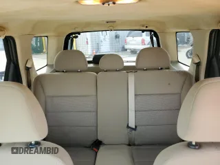 2005 Ford Escape XLT with VIN 1FMYU03165KC03784, listed as a Copart auction lot 64299225 with 185,033 mi miles and Salvage title. Bid and sale history available at DreamBid. Image 10.