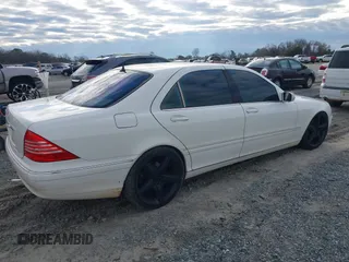 2003 Mercedes-Benz S-Class 4.3L with VIN WDBNG70J83A318268, listed as a IAAI auction lot 41380963 with 243,734 mi miles. Bid and sale history available at carsss.com. Image 4.