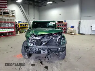 2023 Ford Bronco z VIN 1FMEE5DPXPLB64324, wystawiony jako Copart lot #52914775 z przebiegiem 22 937 mil mil oraz Szkoda całkowita • Salvage title. Historia ofert i sprzedaży dostępna na DreamBid. Obrazek 12.
