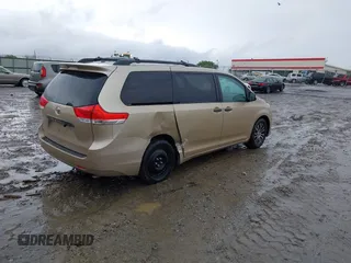 2014 Toyota Sienna XLE with VIN 5TDYK3DC1ES416999, listed as a IAAI auction lot 41972378 with 119,179 mi miles. Bid and sale history available at carsss.com. Image 4.
