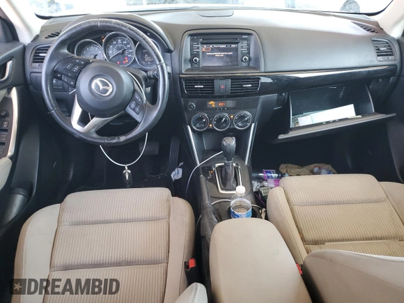 2015 Mazda CX-5 Touring with VIN JM3KE2CY2F0478167, listed as a Copart auction lot 52772805 with 135,492 mi miles and Salvage Title. Bid and sale history available at carsss.com. Image 8.