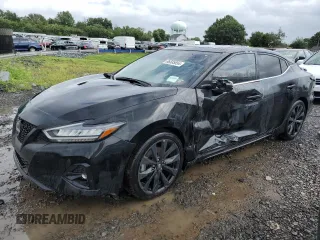 2023 Nissan Maxima SR с VIN 1N4AA6EV8PC506487, выставлен на аукционе Copart как лот 66585654 с пробегом 770 миль миль и Списание • Salvage title. История ставок и продаж доступна на DreamBid. Изображение 1.