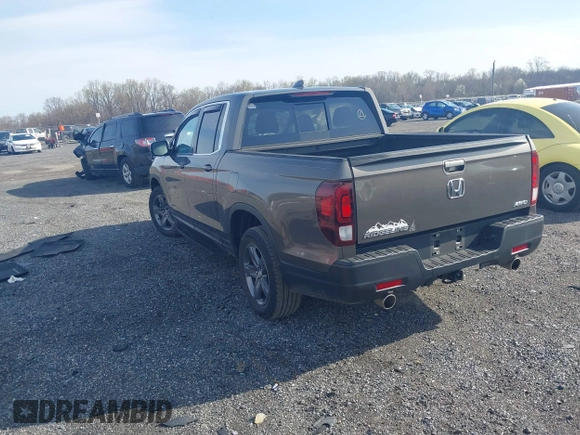 2022 Honda Ridgeline RTL z VIN 5FPYK3F51NB038239, wystawiony jako IAAI lot #41937070 z przebiegiem 39 012 mil mil oraz . Historia ofert i sprzedaży dostępna na DreamBid. Obrazek 3.