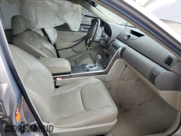 2004 Infiniti G35 w/Leather with VIN JNKCV51E64M614618, listed as a Copart auction lot 65929664 with 340,639 mi miles and Salvage Title. Bid and sale history available at DreamBid. Image 7.