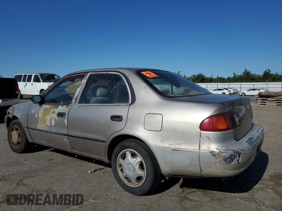 1998 Toyota Corolla VE with VIN 1NXBR12E3WZ093073, listed as a Copart auction lot 58270705 with 303,875 mi miles and Salvage title. Bid and sale history available at DreamBid. Image 2.